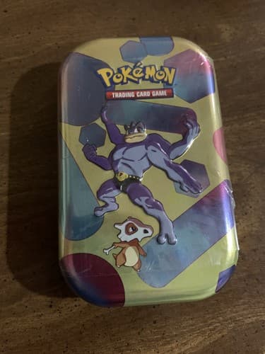 Pokemon TCG S&V 151 Mini Tin – Machamp and Cubone